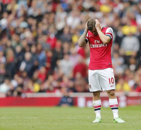 Arsenal s Jack Wilshere looks on dejected - FC Arsenal London vs Aston Villa FC - Barclays Premiership - Emirates Stadium - London - England -17 08 2013 - EDITORIAL USE ONLY. No use with unauthorised audio, video, data, fixture lists, club league logos or live services. Online in-match use limited to 120 images, no video emulation. No use in betting, games or single club league player publications.