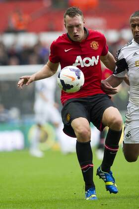 Football - 2013 2014 Premier League - Swansea City vs. Manchester United (ManU) phil jones in action for utd at Liberty Stadium.