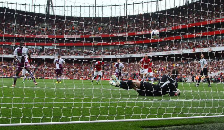 Arsenal FC London v Aston Villa . . London, UK . . 17.08.2013 Christian Benteke (AV) has his penalty kick saved by Wojciech Szczesny(A) but scored on the rebound. 1-1