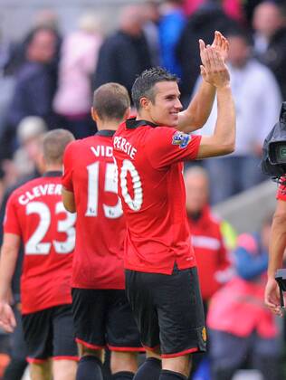 Robin van Persie of Manchester United - Barclays Premier League - Swansea City vs Manchester Utd (ManU) - Liberty Stadium - Swansea - Wales - 17 08 13 - EDITORIAL USE ONLY. No use with unauthorised audio, video, data, fixture lists, club league logos or live services. Online in-match use limited to 120 images, no video emulation. No use in betting, games or single club league player publications.