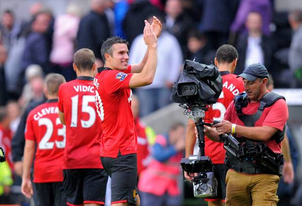 Robin van Persie of Manchester United celebrates the win - Barclays Premier League - Swansea City vs Manchester Utd (ManU) - Liberty Stadium - Swansea - Wales - 17 08 13 - EDITORIAL USE ONLY. No use with unauthorised audio, video, data, fixture lists, club league logos or live services. Online in-match use limited to 120 images, no video emulation. No use in betting, games or single club league player publications.