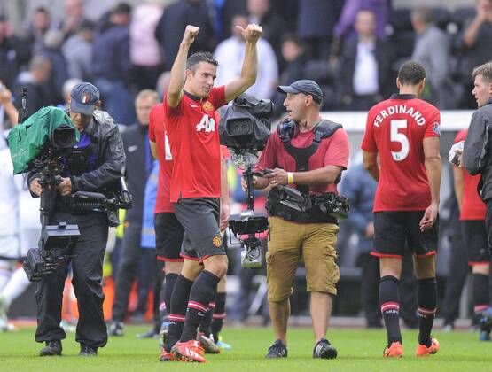 Robin van Persie of Manchester United celebrates the win - Barclays Premier League - Swansea City vs Manchester Utd (ManU) - Liberty Stadium - Swansea - Wales - 17 08 13 - EDITORIAL USE ONLY. No use with unauthorised audio, video, data, fixture lists, club league logos or live services. Online in-match use limited to 120 images, no video emulation. No use in betting, games or single club league player publications.