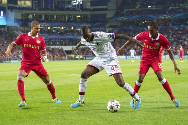 (L-R) Jeffrey Bruma of PSV, Mario Balotelli of AC Milan, Joshua Brenet of PSV during the Champions League qualifier match between PSV and AC Milan at Philips stadium on August 20, 2013 in Eindhoven, The Netherlands. PSV v AC Milan Qualifier Champions League 2013 2014 xVIxxIVx 1739636
