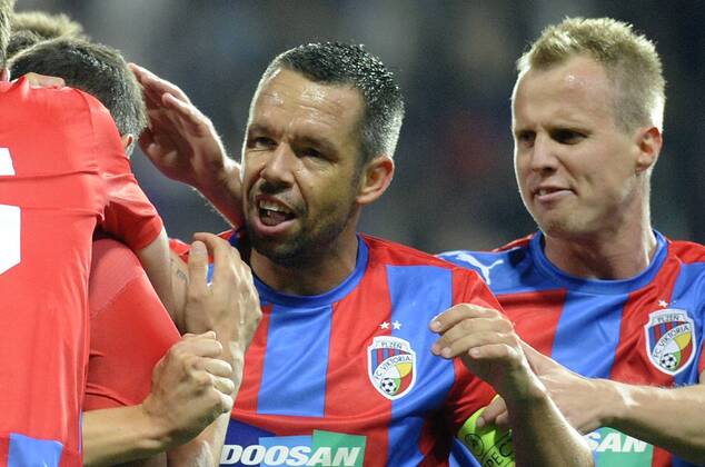 FC Viktoria Plzen players Pavel Horvath and David Limbersky (right) celebrate goal during the FC Viktoria Plzen vs NK Maribor first leg match of Champions League, 4th preliminary round, in Pilsen, Czech Republic, August 20, 2013. (CTKxPhoto PetrxEret) CTKPhotoP201308200715401  ert 4