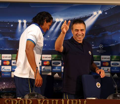 Ersun Yanal head coach of Fenerbahce and Bruno Alves Football Club attends a press conference ahead of their UEFA Chanpions League playoff first leg match against Arsenal in Istanbul 20.08.2013 
