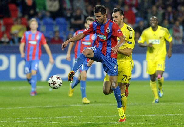 Michal Duris (front, Pilsen) and Amir Dervisevic (Maribor) during the FC Viktoria Plzen vs NK Maribor first leg match of Champions League, 4th preliminary round, in Pilsen, Czech Republic, August 20, 2013. (CTKxPhoto PetrxEret) CTKPhotoP201308200756501  ert 8