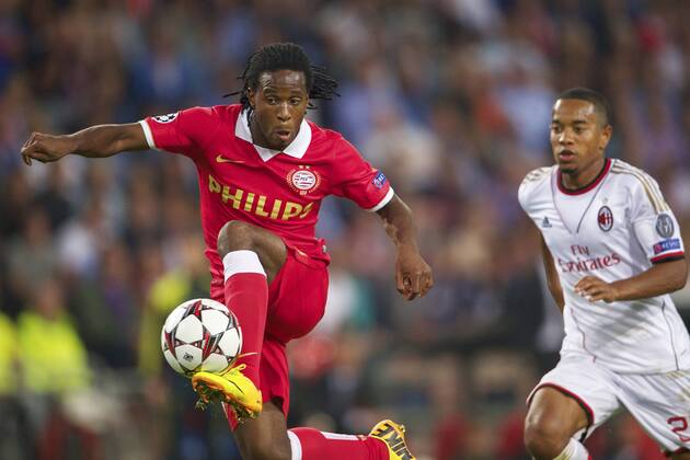 (L-R) Florian Jozefzoon of PSV, Urby Emanuelson of AC Milan during the Champions League qualifier match between PSV and AC Milan at Philips stadium on August 20, 2013 in Eindhoven, The Netherlands. PSV v AC Milan Qualifier Champions League 2013 2014 xVIxxIVx 1739787
