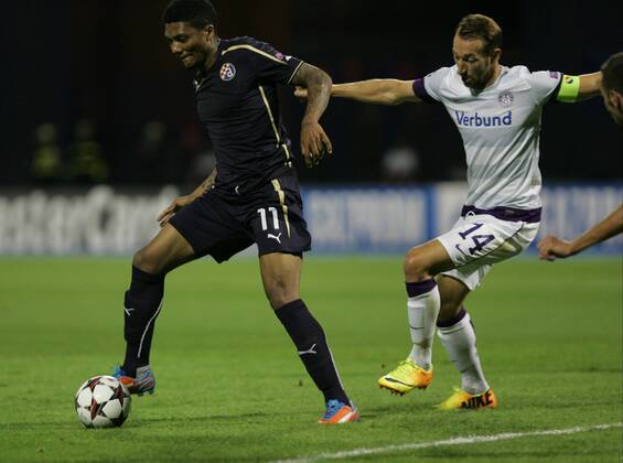 Zagreb, Stadion Maksimir, 21.8.2013., - UEFA Champion League 2013 14, Play-off round 1st leg. GNK Dinamo Zagreb (blue) - Austria Wien (white). FERNANDES DA SILVA Vitoria Antenor Junior vs ORTLECHNER Manuel Dinamo - Austria