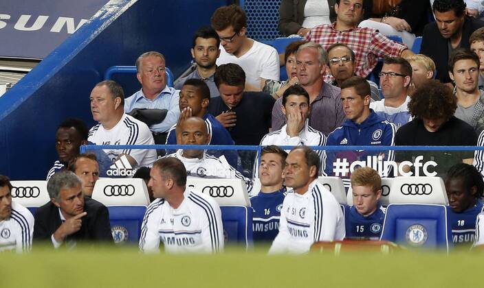 Chelsea s Fernando Torres dropped from the squad watches the match behind Jose Mourinho Chelsea FC London v Aston Villa - Barclays Premiership - Stamford Bridge - London - England -21 08 2013 - Pic David Klein Sportimage EDITORIAL USE ONLY. No use with unauthorised audio, video, data, fixture lists, club league logos or live services. Online in-match use limited to 120 images, no video emulation. No use in betting, games or single club league player publications.
