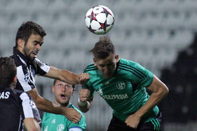 27.08.2013 Thessaloniki FC PAOK-FC Schalke 04 UEFA Champions League Play Off men football Miguel Vitor(L) FC PAOK and Adam Szalai(r) FC Schalke 04 : 