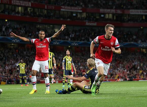 Arsenal s Aaron Ramsey celebrates scoring his sides opening goal Arsenal FC London v Fenerbahce istanbul - UEFA Champions League - Play-off Second Leg - Emirates Stadium - London - England -27 08 2013 - EDITORIAL USE ONLY. No use with unauthorised audio, video, data, fixture lists, club league logos or live services. Online in-match use limited to 120 images, no video emulation. No use in betting, games or single club league player publications.
