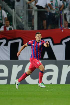 2013.08.27 WARSZAWA, FOOTBALL UEFA CHAMPIONS LEAGUE SEASON 2013 2014 LEGIA WARSZAWA - STEAUA BUKAREST: LUCIAN FILIP Torjubel  20130827PF_RO009
