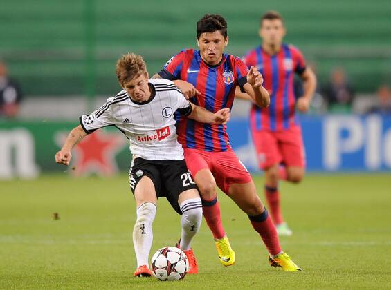 2013.08.27 WARSZAWA, FOOTBALL UEFA CHAMPIONS LEAGUE SEASON 2013 2014 LEGIA WARSZAWA - STEAUA BUKAREST: JAKUB KOSECKI  20130827LUK217