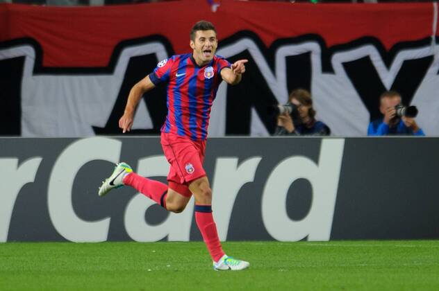 2013.08.27 WARSZAWA, FOOTBALL UEFA CHAMPIONS LEAGUE SEASON 2013 2014 LEGIA WARSZAWA - STEAUA BUKAREST: LUCIAN FILIP Torjubel  20130827PF_RO010