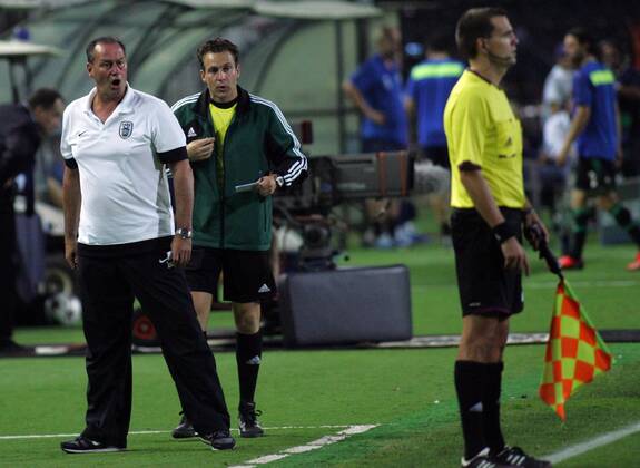 27.08.2013 Thessaloniki(Greece) FC PAOK-FC Schalke 04 UEFA Champions League Play Off men football Huub Stevens(L) FC PAOK coach angry during match at decision of Netherlands assistant referee Sander Van Roekel(r) and Davie Goossens(c) Netherlands fourth official referee : 