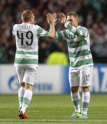 28.08.2013 Glasgow, Scotland. James Forrest and Kris Commons celebrate the opening goal during the Champions League 2nd leg Qualifier between Celtic and Shakhtyor Karaganda from Parkhead Stadium. xVagelisxGeorgarioux  ActionPlus20309742