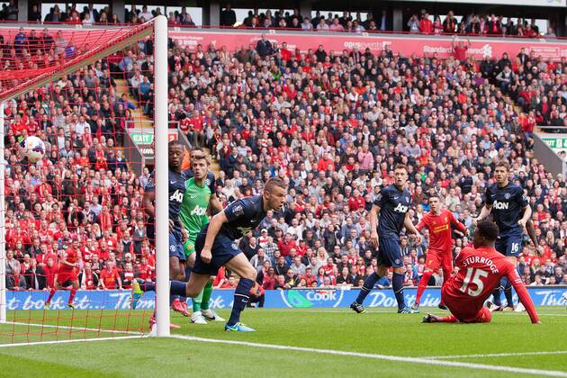 Daniel Sturridge of Liverpool scores the opening goal - Liverpool vs. Manchester United - Barclay s Premier League - Anfield - Liverpool - 01 09 2013 Pic Philip Oldham Sportimage EDITORIAL USE ONLY. No use with unauthorised audio, video, data, fixture lists, club league logos or live services. Online in-match use limited to 120 images, no video emulation. No use in betting, games or single club league player publications.