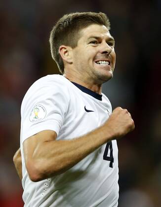 Steven Gerrard of England celebrates scoring during the FIFA 2014 World Cup Qualifying Group H match between England and Moldova at Wembley Stadium in London, Britain on Sept. 6, 2013. England won 4-0.(Xinhua Wang Lili) (SP)BRITAIN-LONDON-SOCCER-FIFA 2014 WORLD CUP QUALIFIER-ENGLAND VS MOLDOVA