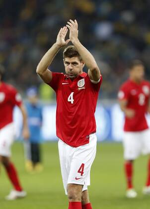 England s Steven Gerrard celebrates at the final whistle Ukraine v England - 2014 World Cup Qualifier - Olympic Stadium - Kiev - Ukraine -10 09 2013 - Pic David Klein Sportimage EDITORIAL USE ONLY. No use with unauthorised audio, video, data, fixture lists, club league logos or live services. Online in-match use limited to 120 images, no video emulation. No use in betting, games or single club league player publications.