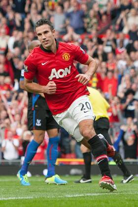 Robin van Persie of Manchester United celebrates his opening goal - Manchester United ManU vs. Crystal Palace - Premier League - Old Trafford - Manchester - 14 09 2013 EDITORIAL USE ONLY. No use with unauthorised audio, video, data, fixture lists, club league logos or live services. Online in-match use limited to 120 images, no video emulation. No use in betting, games or single club league player publications.