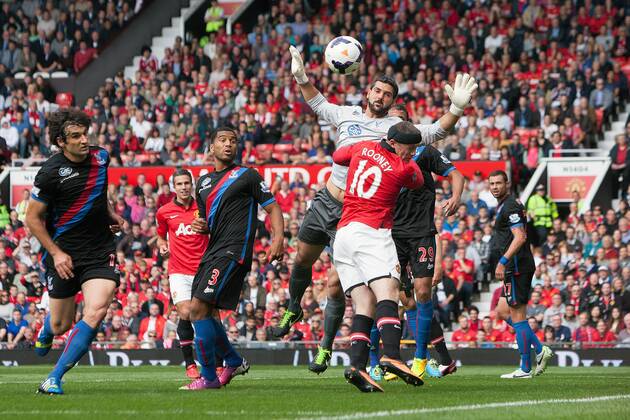 Wayne Rooney of Manchester United struggles to reach a headed chance - Manchester United ManU vs. Crystal Palace - Premier League - Old Trafford - Manchester - 14 09 2013 EDITORIAL USE ONLY. No use with unauthorised audio, video, data, fixture lists, club league logos or live services. Online in-match use limited to 120 images, no video emulation. No use in betting, games or single club league player publications.