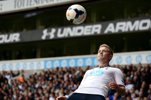 Tottenham s Lewis Holtby chests the ball - Tottenham Hotspur vs Norwich City - Premier League 2013 14 - White Hart Lane - London - 14th September 2013 - EDITORIAL USE ONLY. No use with unauthorised audio, video, data, fixture lists, club league logos or live services. Online in-match use limited to 120 images, no video emulation. No use in betting, games or single club league player publications.