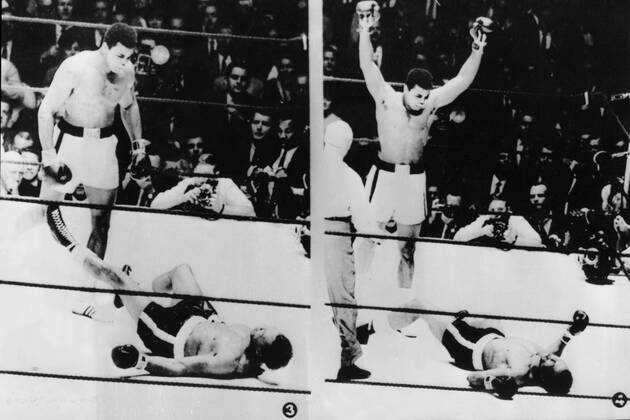 Referee Harry Kessler stops the World Heavyweight title fight in Houston, Texas between champion Cassius Clay and challenger Cleveland Williams after one minute and eight seconds of the 3rd round. Clay retained his title on a technical knock-out. 14th November 1966.  UnitedArchives00926614