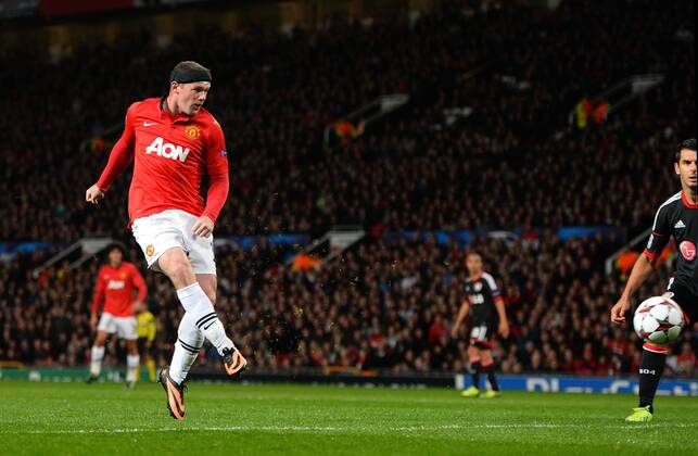 Wayne Rooney of Manchester United scoring the first goal - UEFA Champions League Group A - Manchester Utd vs Bayer Leverkusen - Old Trafford Stadium - Manchester - 17 09 13 - Picture Simon Bellis Sportimage EDITORIAL USE ONLY. No use with unauthorised audio, video, data, fixture lists, club league logos or live services. Online in-match use limited to 120 images, no video emulation. No use in betting, games or single club league player publications.
