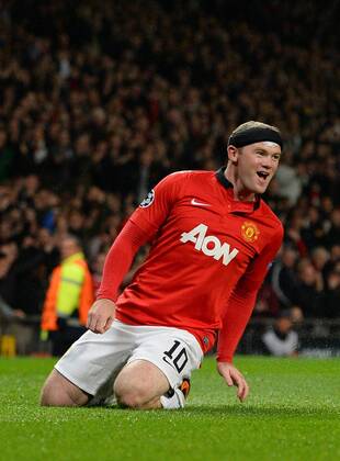 Wayne Rooney of Manchester United celebrates scoring the first goal - UEFA Champions League Group A - Manchester Utd vs Bayer Leverkusen - Old Trafford Stadium - Manchester - 17 09 13 - Picture Simon Bellis Sportimage EDITORIAL USE ONLY. No use with unauthorised audio, video, data, fixture lists, club league logos or live services. Online in-match use limited to 120 images, no video emulation. No use in betting, games or single club league player publications.