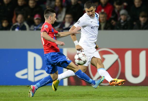 Aleksandar Kolarov (right) of Manchester City and Milan Petrzela of Viktoria Plzen during the Champion s League Group D soccer match Viktoria Plzen vs Manchester City, Pilsen, Czech Republic, September 17, 2013. (CTKxPhoto MichalxKamaryt) CTKPhotoP201309170846501  kmt 2