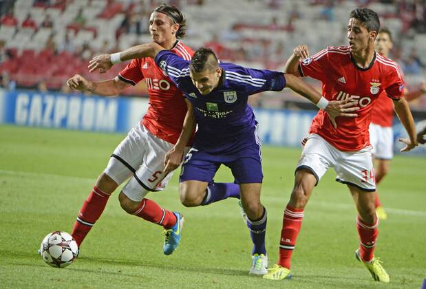 Aleksandar Mitrovic of RSC Anderlecht and Ljubomir Fejsa of Benfica and Andre Almedia of Benfica FOOTBALL : Benfica Lissabon vs RSC Anderlecht - Champions League - 17 09 2013 PhotoNews Panoramic 