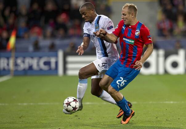 Vincent Kompany (left) of Manchester City and Daniel Kolar of Viktoria Plzen during the Champion s League Group D soccer match Viktoria Plzen vs Manchester City, Pilsen, Czech Republic, September 17, 2013. (CTKxPhoto MichalxKamaryt) CTKPhotoP201309170870501  kmt 5
