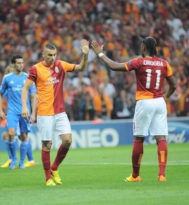 UEFA Champions League group B match between Galatasaray and Real Madrid at Turk Telekom Arena Stadium on September 17, 2013 in Istanbul,Turkey. Pictured: Burak Yilmaz (L) and Didier Drogba of Galatasaray. 