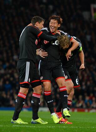 Simon Rolfes , Heung Min Son - - UEFA Champions League Group A - Manchester United (ManU) vs Bayer 04 Leverkusen - Old Trafford Stadium - Manchester - 17 09 13 - Picture SimonxBellis Sportimage EDITORIAL USE ONLY. No use with unauthorised audio, video, data, fixture lists, club league logos or live services. Online in-match use limited to 120 images, no video emulation. No use in betting, games or single club league player publications.