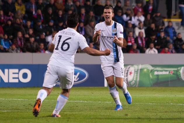 Edin Dzeko of Manchester City celebrates his opening goal - Viktoria Plzen vs. Manchester City - UEFA Champion s League - Doosan Arena - Plzen, Czech Republic - 17 09 2013 Pic Philip Oldham Sportimage EDITORIAL USE ONLY. No use with unauthorised audio, video, data, fixture lists, club league logos or live services. Online in-match use limited to 120 images, no video emulation. No use in betting, games or single club league player publications.