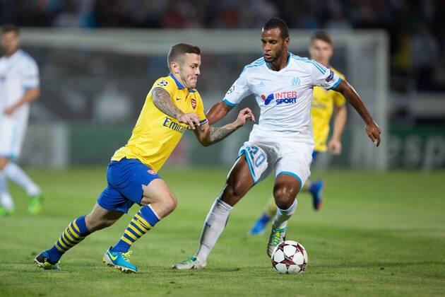 Arsenal s Jack Wilshere and Alaixys Ramao of Marseille - Olympique de Marseille vs. Arsenal FC London - UEFA Champion s League - Stade Velodrome - Marseille, France - 18 09 2013 Pic Philip Oldham Sportimage EDITORIAL USE ONLY. No use with unauthorised audio, video, data, fixture lists, club league logos or live services. Online in-match use limited to 120 images, no video emulation. No use in betting, games or single club league player publications.
