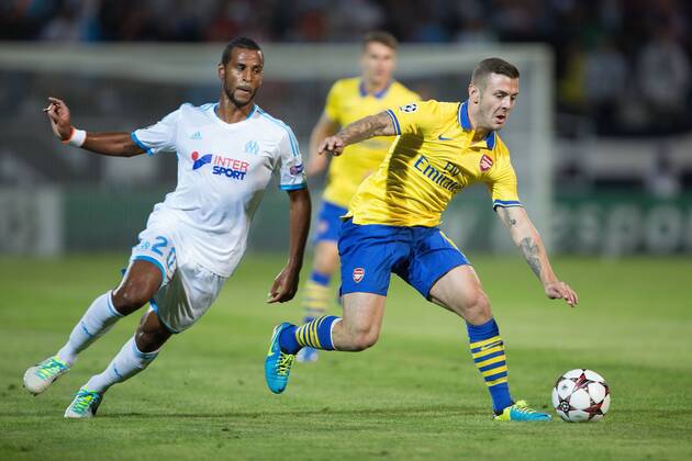 Arsenal s Jack Wilshere and Alaixys Ramao of Marseille - Olympique de Marseille vs. Arsenal FC London - UEFA Champion s League - Stade Velodrome - Marseille, France - 18 09 2013 Pic Philip Oldham Sportimage EDITORIAL USE ONLY. No use with unauthorised audio, video, data, fixture lists, club league logos or live services. Online in-match use limited to 120 images, no video emulation. No use in betting, games or single club league player publications.