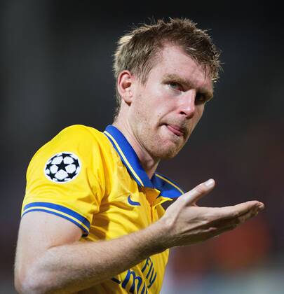 Arsenal s Per Mertesacker reacts - Olympique de Marseille vs. Arsenal FC London - UEFA Champion s League - Stade Velodrome - Marseille, France - 18 09 2013 Pic Philip Oldham Sportimage EDITORIAL USE ONLY. No use with unauthorised audio, video, data, fixture lists, club league logos or live services. Online in-match use limited to 120 images, no video emulation. No use in betting, games or single club league player publications.