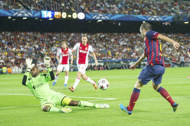 (L-R) goalkeeper Kenneth Vermeer of Ajax,Andres Iniesta of FC Barcelona during the Champions League match between FC Barcelona and Ajax Amsterdam on September 18, 2013 at the Camp Nou stadium in Barcelona, Spain FC Barcelona v Ajax Champions League 2013 2014 xVIxxIVx 1796327
