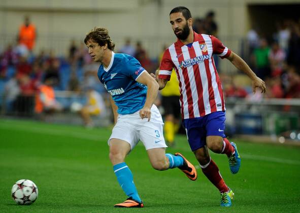 number 3 Cristian Ansaldi - Cristian Ansaldi (26), Atletico de Madrid Midfielder, number 10 ARDA - Arda Turan (25) during round 1 of the Champions league, soccer match between Atletico de Madrid - FK Zenit St. Petersburg FK aGregorioxLopez. 