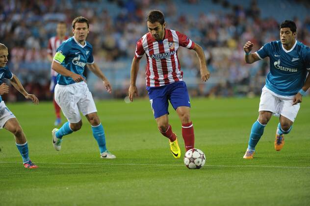 Atletico de Madrid Forward, number 7 ADRIAN - Adrian Lopez Alvarez (24) during round 1 of the UEFA CHAMPIONS LEAGUE league, soccer match between Atletico de Madrid - Football Club Zenit St. Petersburg FK VICENTE CALDERON estadium, Madrid - MiguelxLopez. 