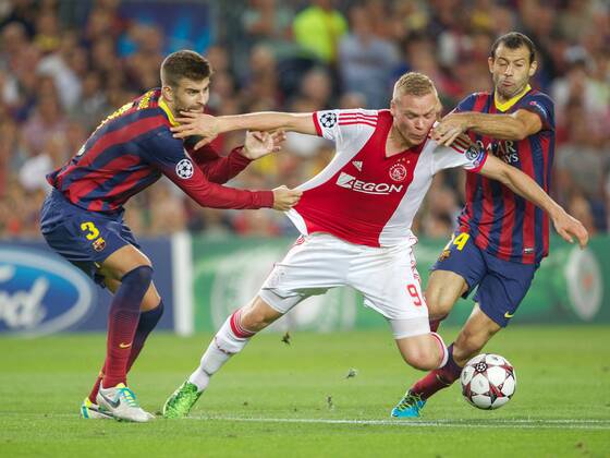 (L-R) Gerard Pique of FC Barcelona, Kolbeinn Sigthorsson of Ajax, Cesc Fabregas of FC Barcelona during the Champions League match between FC Barcelona and Ajax Amsterdam on September 18, 2013 at the Camp Nou stadium in Barcelona, Spain FC Barcelona v Ajax Champions League 2013 2014 xVIxxIVx 1796345