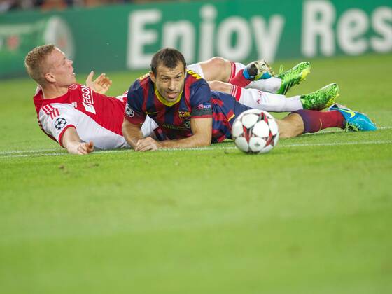 (L-R) Kolbeinn Sigthorsson of Ajax, Cesc Fabregas of FC Barcelona during the Champions League match between FC Barcelona and Ajax Amsterdam on September 18, 2013 at the Camp Nou stadium in Barcelona, Spain FC Barcelona v Ajax Champions League 2013 2014 xVIxxIVx 1796349