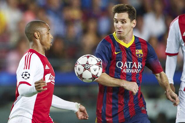 (L-R) Lerin Duarte of Ajax, Lionel Messi of FC Barcelona during the Champions League match between FC Barcelona and Ajax Amsterdam on September 18, 2013 at the Camp Nou stadium in Barcelona, Spain FC Barcelona v Ajax Champions League 2013 2014 xVIxxIVx 1796354