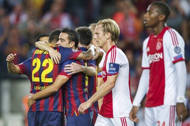 (L-R) Dani Alves of FC Barcelona, Xavi Hernandez of FC Barcelona , Lionel Messi of FC Barcelona, Christian Poulsen of Ajax, Stefano Denswil of Ajax during the Champions League match between FC Barcelona and Ajax Amsterdam on September 18, 2013 at the Camp Nou stadium in Barcelona, Spain FC Barcelona v Ajax Champions League 2013 2014 xVIxxIVx 1797094