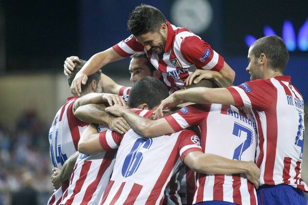 Atletico de Madrid s players celebrate goal during Champions League 2013 2014 match.September 18,2013.  (20453652)