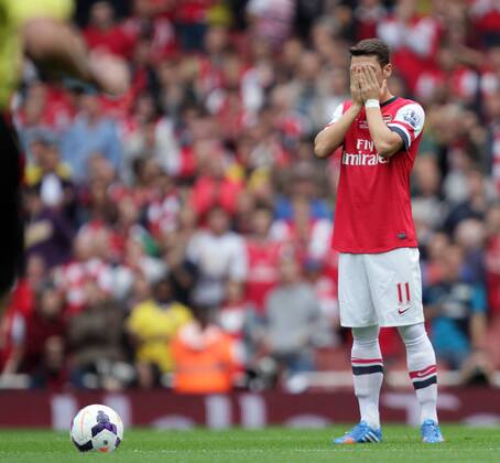 Arsenal v Stoke City . . London, UK . . 22.09.2013 Mesut Ozil (A) takes a moment before the start of the game.