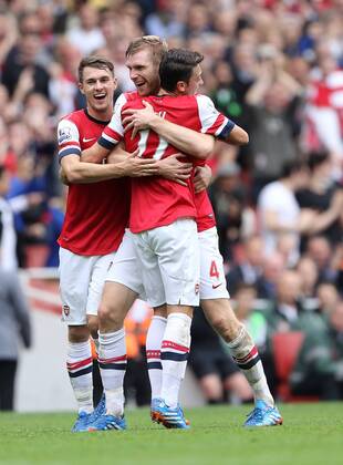 Arsenal s Per Mertesacker celebrates scoring his sides second goal Arsenal v Stoke - Barclays Premier League- Emirates Stadium - London - England -22 09 2013 - EDITORIAL USE ONLY. No use with unauthorised audio, video, data, fixture lists, club league logos or live services. Online in-match use limited to 120 images, no video emulation. No use in betting, games or single club league player publications.