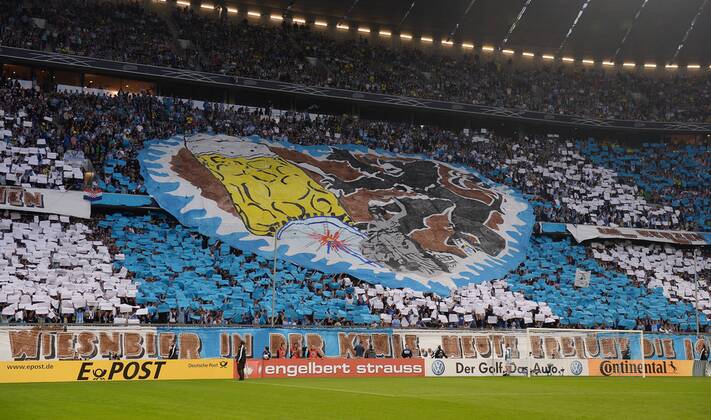 FUSSBALL DFB POKAL 1. RUNDE SAISON 2013 2014 TSV 1860 Muenchen - 24.09.2013 1860 Muenchen Fans mit einer Oktoberfest Fanchoreographie in der Nordkurve der Allianz Arena in Muenchen