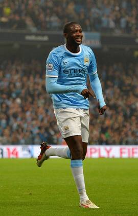 Yaya Toure of Manchester City celebrates scoring from a free kick for the third goal - Capital One Cup - Third Round - Manchester City vs Wigan Athletic - Etihad Stadium - Manchester - 24 09 13 - Picture Simon Bellis Sportimage EDITORIAL USE ONLY. No use with unauthorised audio, video, data, fixture lists, club league logos or live services. Online in-match use limited to 120 images, no video emulation. No use in betting, games or single club league player publications.